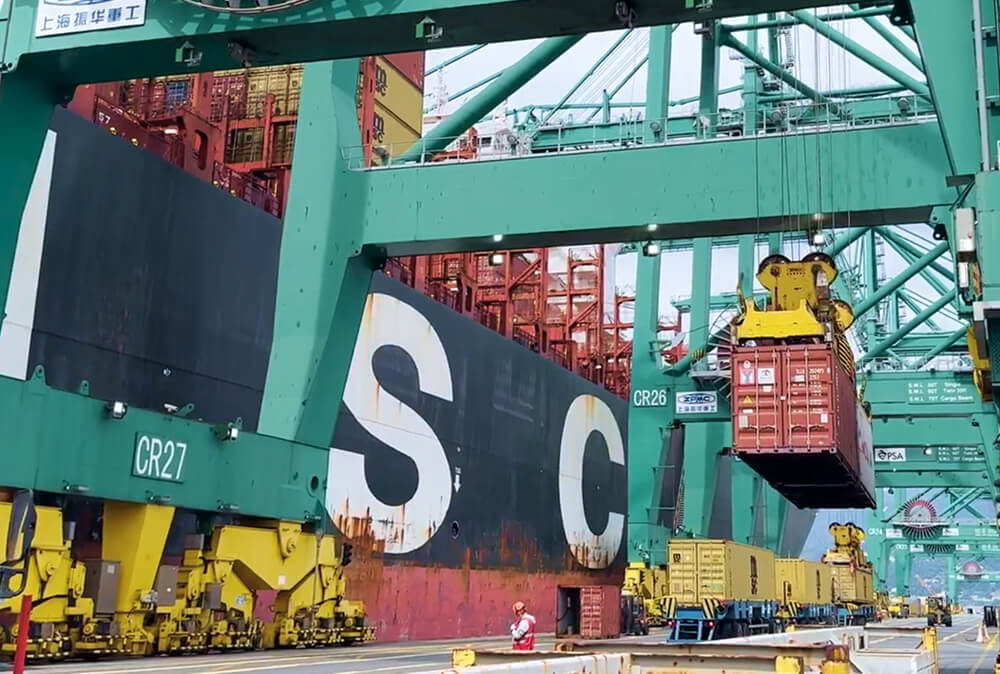 Cargo containers loaded on a freighter
