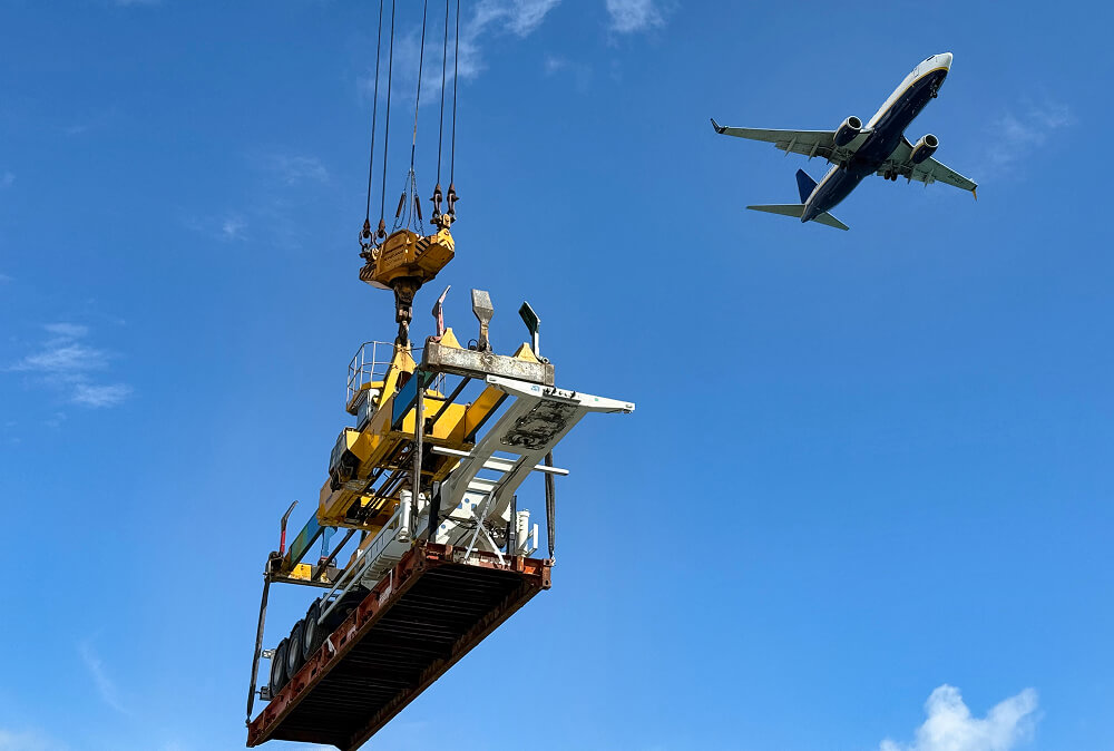 Detail of hanged cargo component with airplane